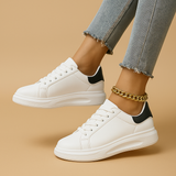 White leather sneakers with minimalist design for women | Jinte