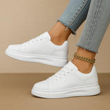White leather sneakers with minimalist design for women | Jinte