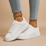 White leather sneakers with minimalist design for women | Jinte