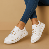 White sneakers with gold detail for women | Fleur